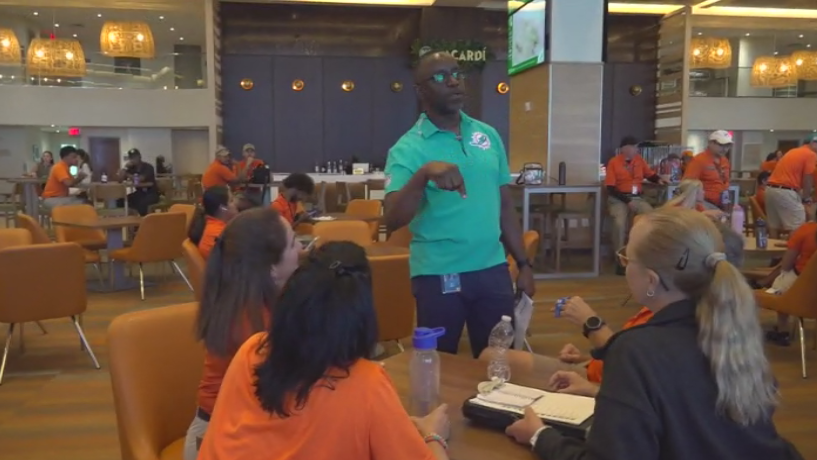 Miami Dade College professor finds his passion with side job at Hard Rock Stadium — CBS Miami, Pembroke Pines Arts news