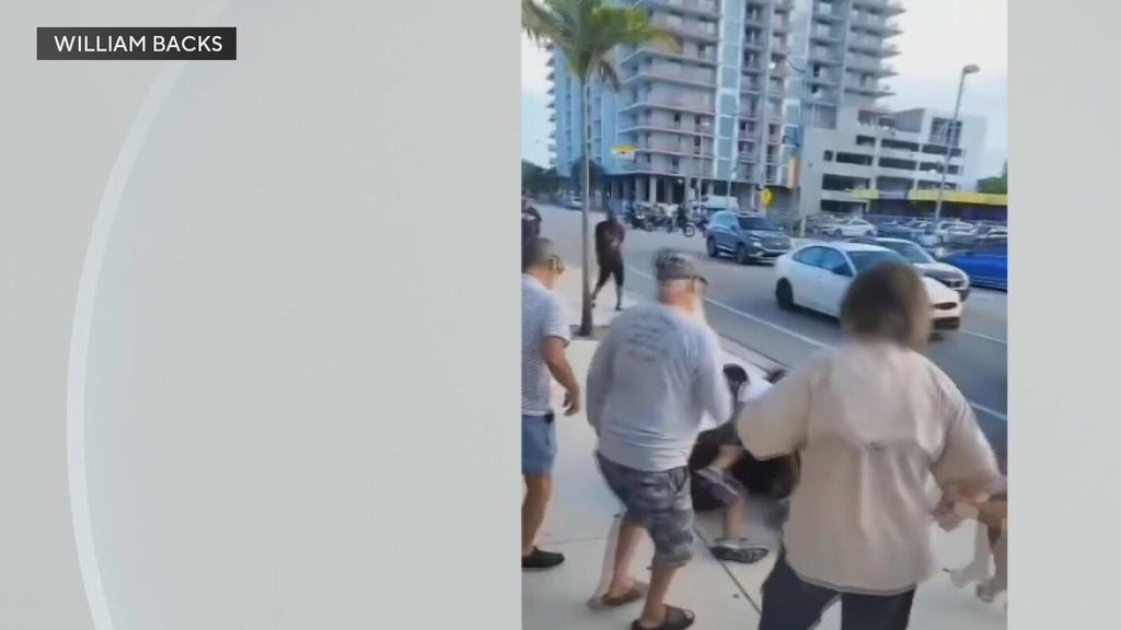 2 men speak out after video shows them being assaulted during "street takeover" in front of Broward pub — CBS Miami, Pembroke Pines Schools news