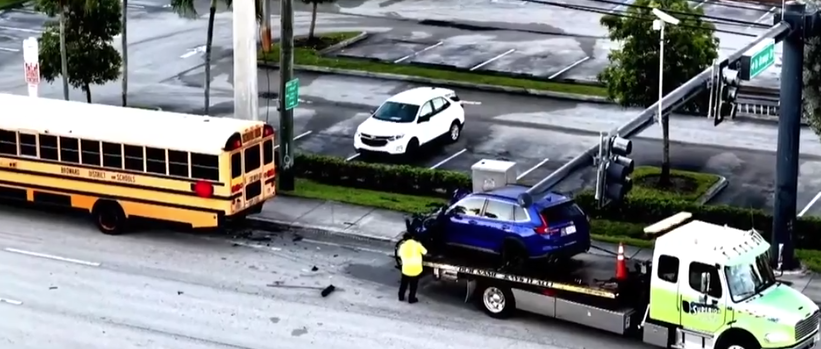 SUV driver hospitalized after rear-ending school bus in Davie; EB Griffin Road closed near SW 82nd Ave — WSVN 7 Broward