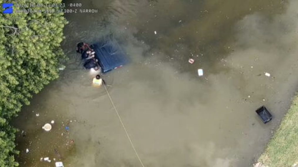 Drone video shows first responders removing elderly driver from submerged truck in Sunrise — WSVN 7 Broward